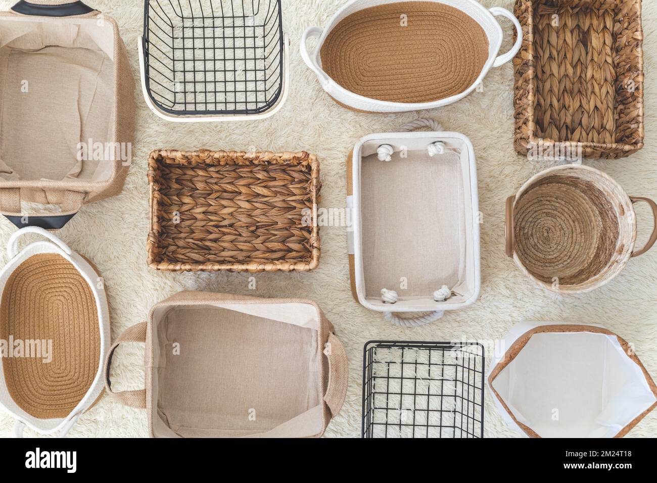 Flat lay of storage boxes; containers and baskets with different sizes and shapes Stock Photo