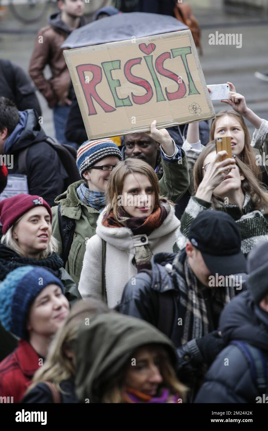 Peolple are gathering for a protest against US President Donald Trump's executive immigration ban, Monday 30 January 2017in Brussels. President Trump signed the controversial executive order that halted refugees and residents from predominantly Muslim countries from entering the United States. BELGA PHOTO THIERRY ROGE Stock Photo