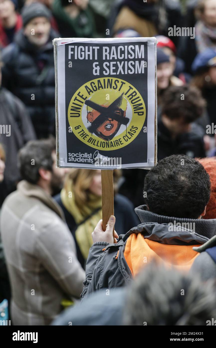 Peolple are gathering for a protest against US President Donald Trump's executive immigration ban, Monday 30 January 2017in Brussels. President Trump signed the controversial executive order that halted refugees and residents from predominantly Muslim countries from entering the United States. BELGA PHOTO THIERRY ROGE Stock Photo