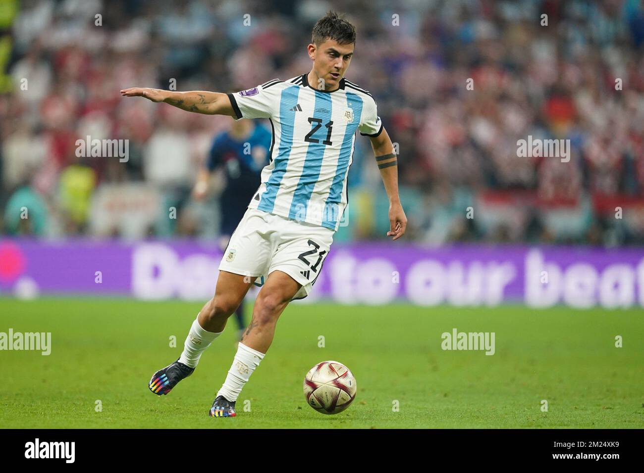 DOHA, QATAR - DECEMBER 13: Player of Argentina Paulo Dybala controls the ball during the FIFA World Cup Qatar 2022 Semi-finals match between Argentina and Croatia at Lusail Stadium on December 13, 2022 in Lusail, Qatar. (Photo by Florencia Tan Jun/PxImages) Stock Photo