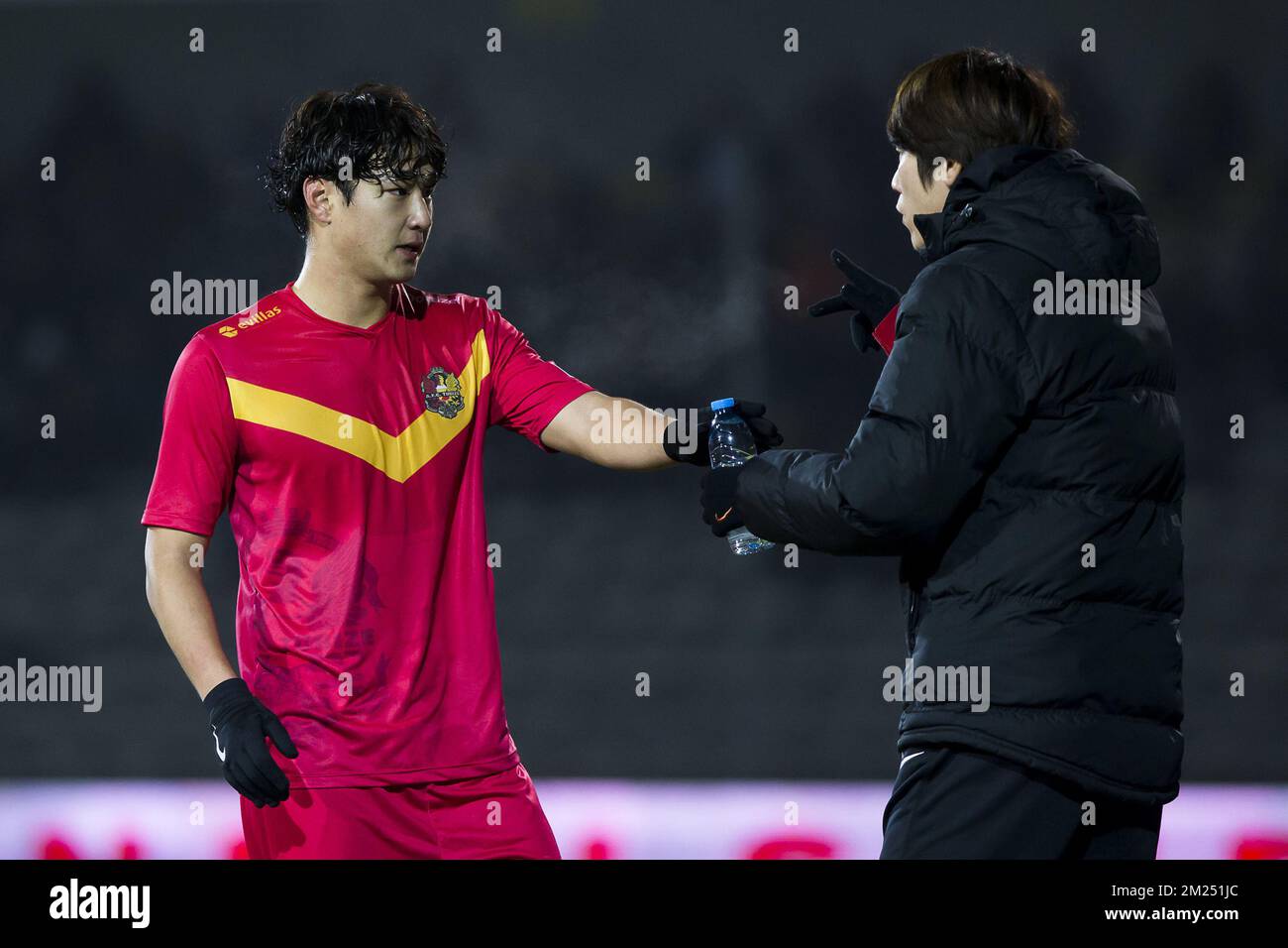 Tubize's Jae Gun Lee and Tubize's assistant coach Eun Jung Kim pictured during the Proximus League match of D1B between Lierse SK and AFC Tubize, in Lier, Saturday 04 February 2017, on day 25 of the Belgian soccer championship, division 1B. BELGA PHOTO KRISTOF VAN ACCOM Stock Photo