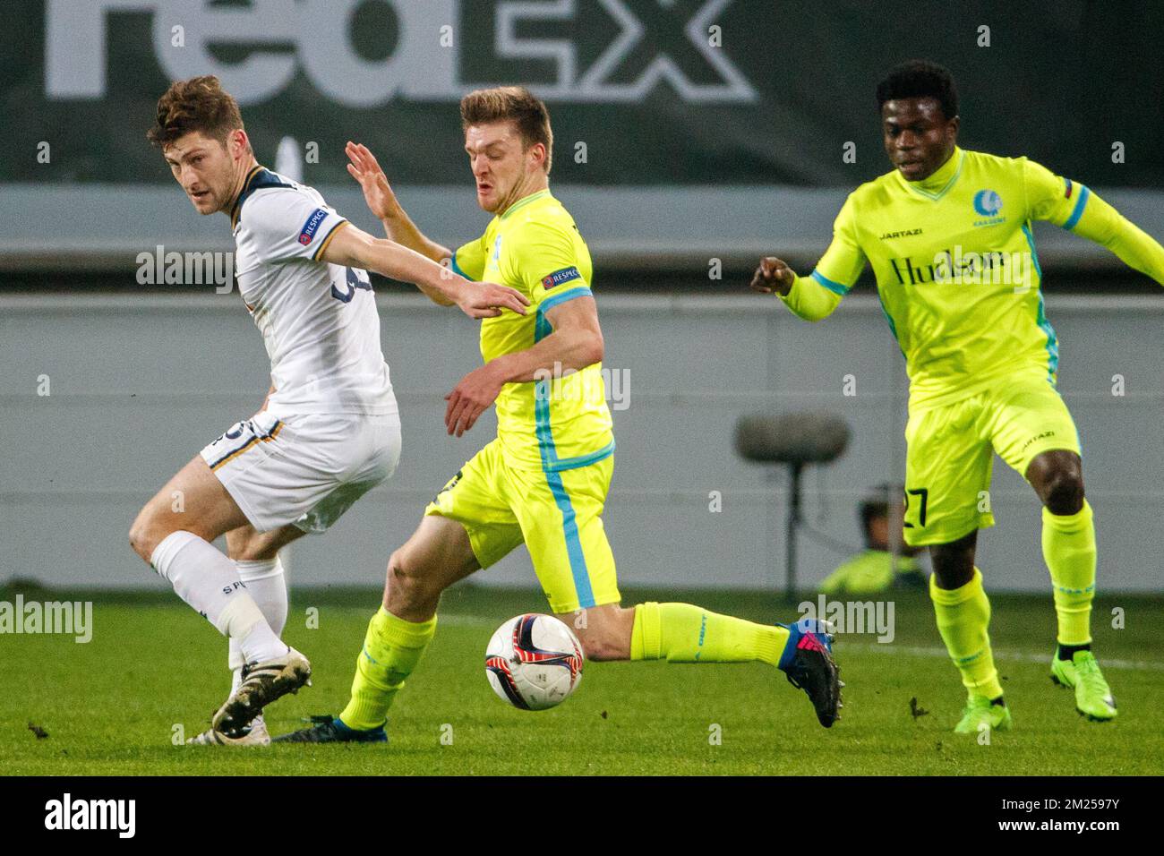 Tottenham's defender Ben Davies and Gent's Thomas Foket fight for the ball during a game between Belgian soccer team KAA Gent and British team Tottenham, first-leg of the 1/16 finals of the Europa League competition, Thursday 16 February 2017, in Gent. BELGA PHOTO KURT DESPLENTER Stock Photo