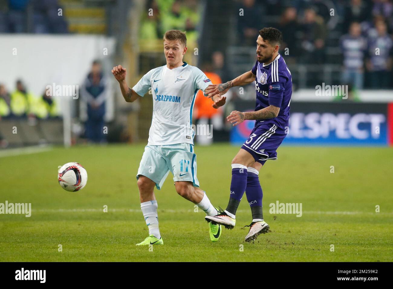 Zenit's midfielder's Oleg Shatov and Anderlecht's Nicolae-Claudiu Stanciu fight for the ball during a game between Belgian soccer team RSC Anderlecht and Russian team FC Zenit, first-leg of the 1/16 finals of the Europa League competition, Thursday 16 February 2017, in Brussels. BELGA PHOTO BRUNO FAHY Stock Photo