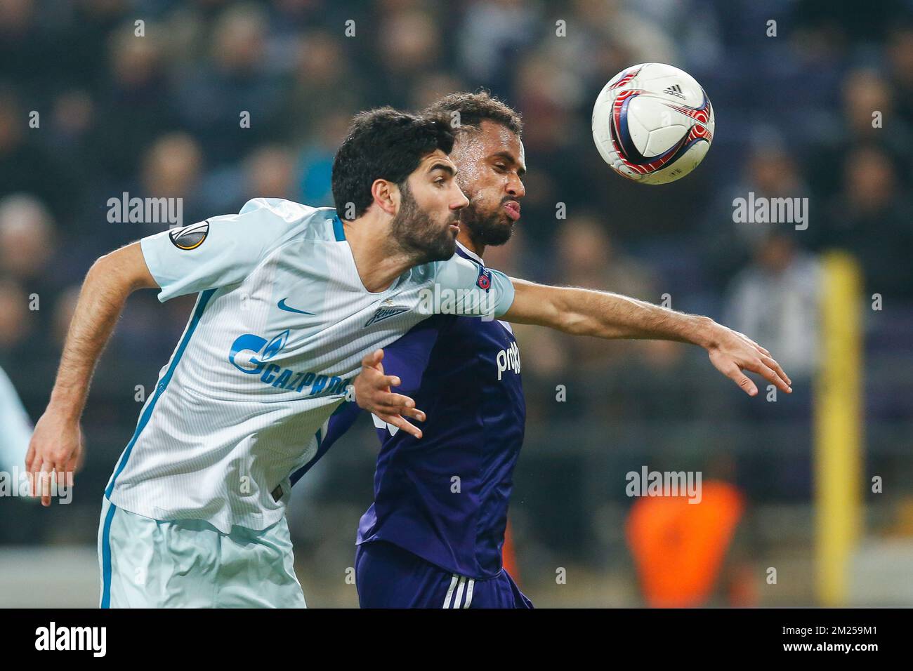 Zenit's defender Luis Neto and Anderlecht's Isaac Kiese Thelin fight for the ball during a game between Belgian soccer team RSC Anderlecht and Russian team FC Zenit, first-leg of the 1/16 finals of the Europa League competition, Thursday 16 February 2017, in Brussels. BELGA PHOTO BRUNO FAHY Stock Photo