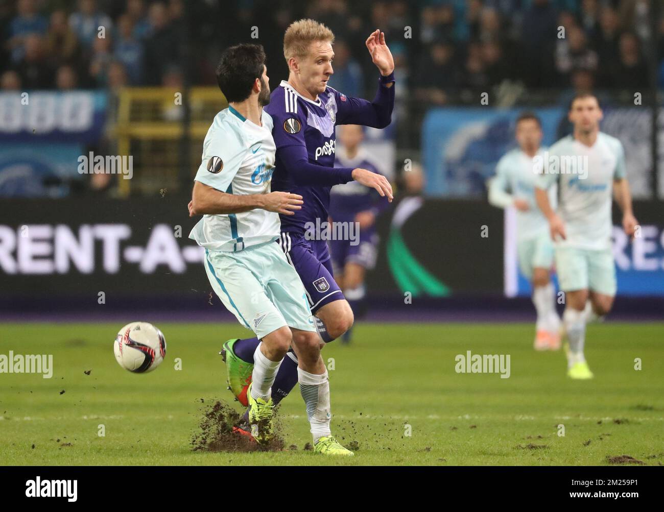 Zenit's defender Luis Neto and Anderlecht's Lukasz Teodorczyk fight for the ball during a game between Belgian soccer team RSC Anderlecht and Russian team FC Zenit, first-leg of the 1/16 finals of the Europa League competition, Thursday 16 February 2017, in Brussels. BELGA PHOTO VIRGINIE LEFOUR Stock Photo