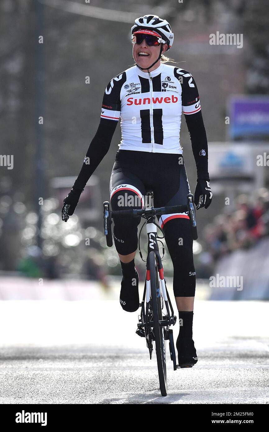 Winner Dutch Lucinda Brand of Team Sunweb celebrates on the finish line of the women edition of Omloop Het Nieuwsblad the first cycling race of the season in Belgium Saturday 25 February