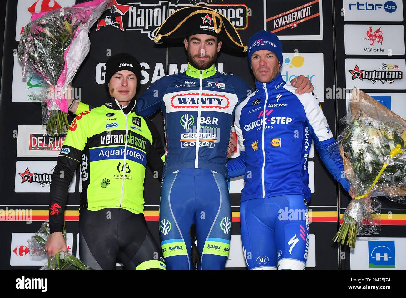 L-R, second, Luxembourgian Alex Kirsch of WB Veranclassic Aqua Protect, winner Belgian Guillaume Van Keirsbulck of Wanty-Groupe Gobert and third, Belgian Iljo Keisse of Quick-Step Floors celebrate on the podium after the 49th edition of the Grand Prix du Samyn cycling race, Wednesday 01 March 2017. The race starts in Quaregnon and ends in Dour (202,6km). The Grand Prix du Samyn is also the first round of the Napoleon Games Cup. BELGA PHOTO DAVID STOCKMAN Stock Photo