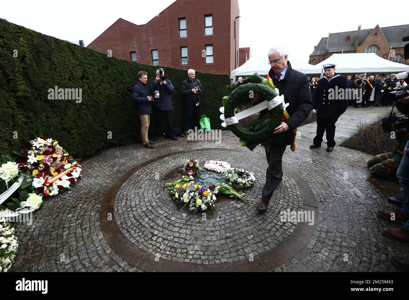 West-Flanders province governor Carl Decaluwe displays a wreath (flowers) at a tribute ceremony for the 30th anniversary of the Herald of Free Enterprise ferry disaster, on Monday 06 March 2017 in Zeebrugge. On 6 March 1987 the ferry left the harbor of Zeebrugge, bound for Dover with more than 450 passengers and 80 crew members on board. It capsized just outside the harbor. The disaster, which was caused by the failure to close the bow doors, cost the life of 194 people. BELGA PHOTO KURT DESPLENTER  Stock Photo