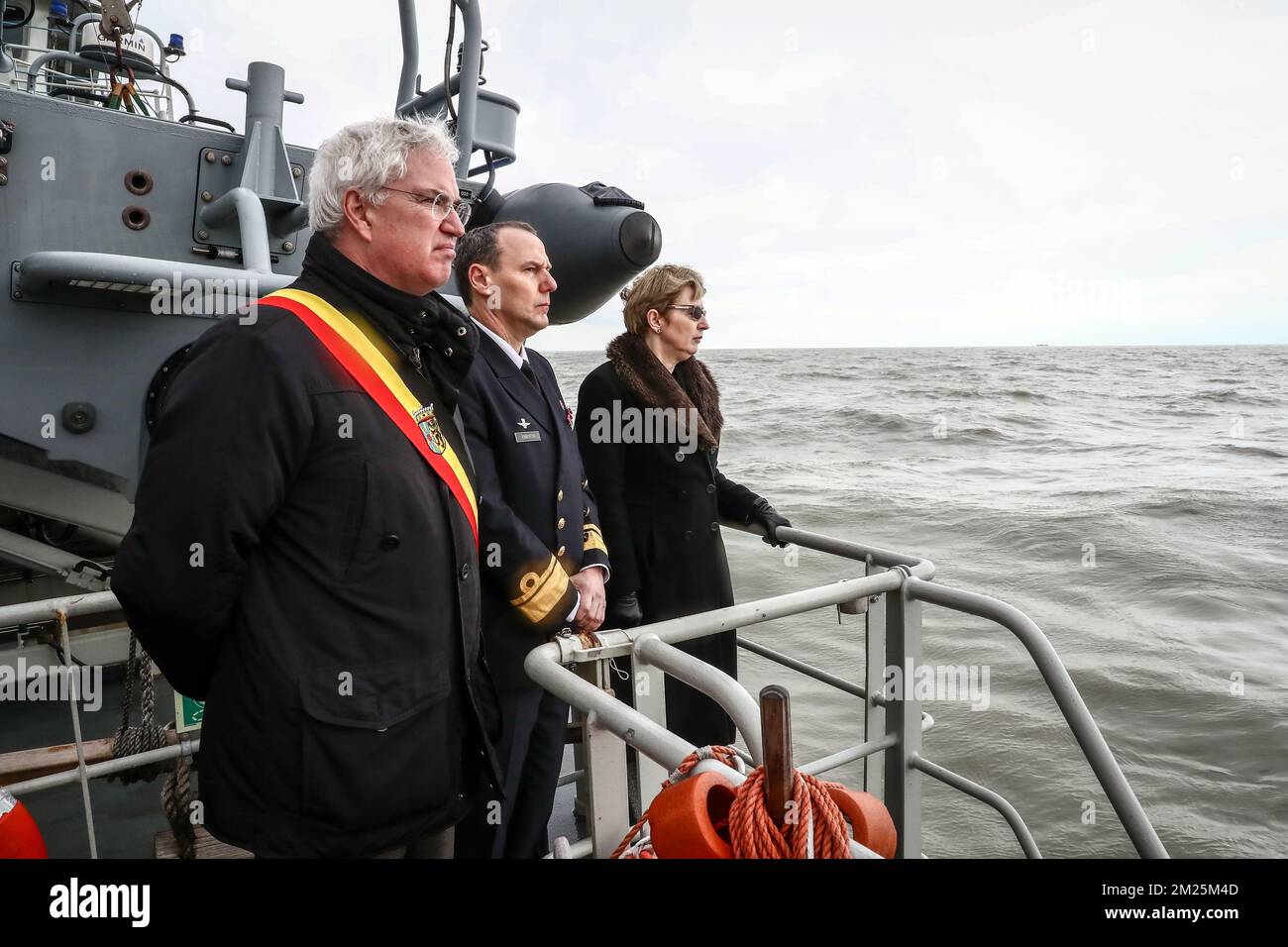 West-Flanders province governor Carl Decaluwe, Navy Commander Wim Robberecht and UK ambassador in Belgium, Alison Rose pictured during the 30th anniversary of the Herald of Free Enterprise ferry disaster, on Monday 06 March 2017 in Zeebrugge. On 6 March 1987 the ferry left the harbor of Zeebrugge, bound for Dover with more than 450 passengers and 80 crew members on board. It capsized just outside the harbor. The disaster, which was caused by the failure to close the bow doors, cost the life of 194 people. BELGA PHOTO KURT DESPLENTER Stock Photo