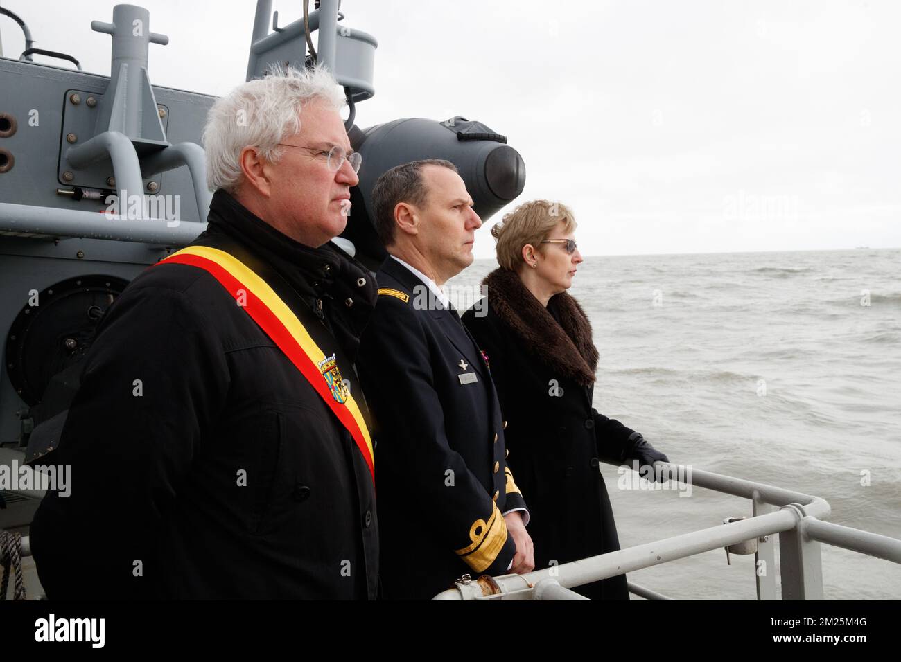 West-Flanders province governor Carl Decaluwe, Navy Commander Wim Robberecht and UK ambassador in Belgium, Alison Rose pictured during the 30th anniversary of the Herald of Free Enterprise ferry disaster, on Monday 06 March 2017 in Zeebrugge. On 6 March 1987 the ferry left the harbor of Zeebrugge, bound for Dover with more than 450 passengers and 80 crew members on board. It capsized just outside the harbor. The disaster, which was caused by the failure to close the bow doors, cost the life of 194 people. BELGA PHOTO KURT DESPLENTER Stock Photo