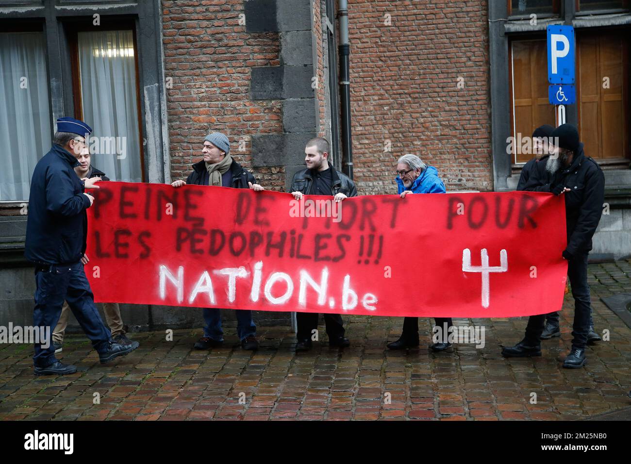 Illustration picture shows a protest of nationalist militant movement Nation outside the Namur council chamber following complaints filed by Jan and Leendert Lambrecks, father and brother of Dutroux victim Eefje, in Namur, Thursday 09 March 2017. Michelle Martin, ex-wife of Belgian serial killer, child abductor and molester Marc Dutroux, got sentenced to 30 years in jail, but was released after she served 16 years. BELGA PHOTO BRUNO FAHY Stock Photo