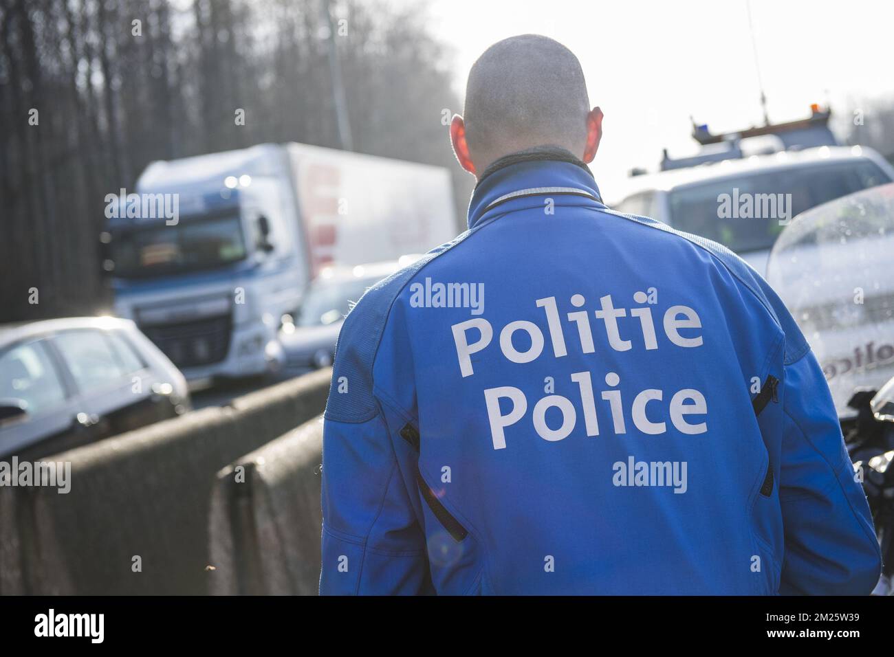 Illustration picture shows police during a control on fraud on the kilometer tax by Viapass, the government organization that monitors and controls the kilometer tax, Tuesday 14 March 2017, at Carrefour Leonard - Leonardkruispunt in Brussels. On 01 April 216, the Flemish, Walloon and Brussels Capital regions introduced a kilometer tax for trucks weighting more than 3.5 tons. Belgian and foreign trucks must have an OBU, On Board Unit, when driving on public roads in Belgium. BELGA PHOTO LAURIE DIEFFEMBACQ  Stock Photo