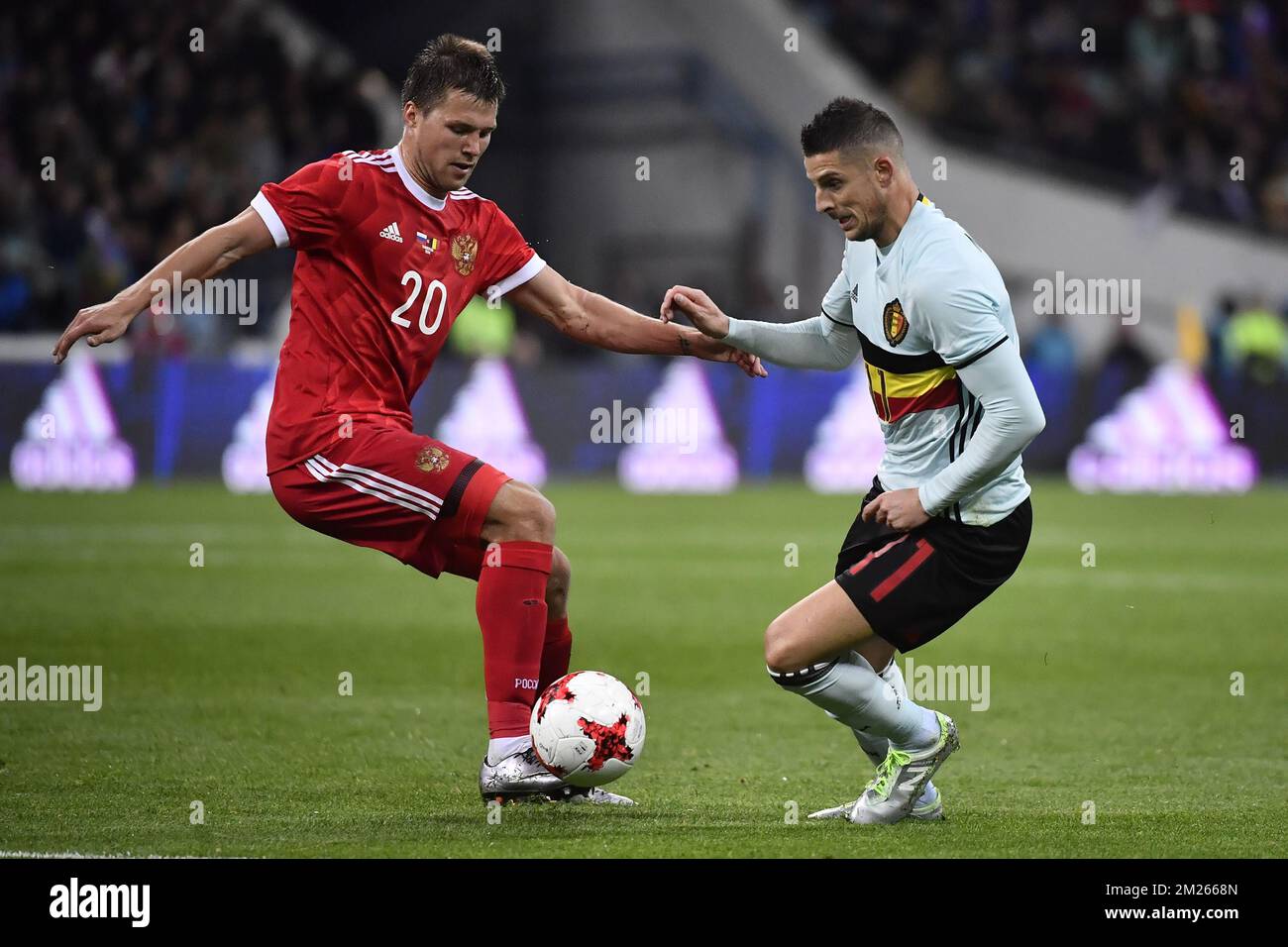 Russia's Maksim Kanunnikov and Belgium's Kevin Mirallas fight for the ball during a friendly game between Belgium's Red Devils and Russia, on Tuesday 28 March 2017, in Adler, Russia. BELGA PHOTO DIRK WAEM Stock Photo