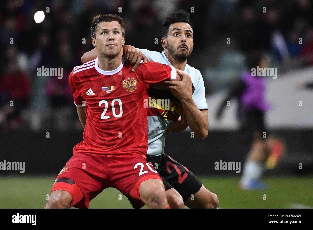 Russia's Maksim Kanunnikov and Belgium's Nacer Chadli fight for the ball during a friendly game between Belgium's Red Devils and Russia, on Tuesday 28 March 2017, in Adler, Russia. BELGA PHOTO DIRK WAEM Stock Photo