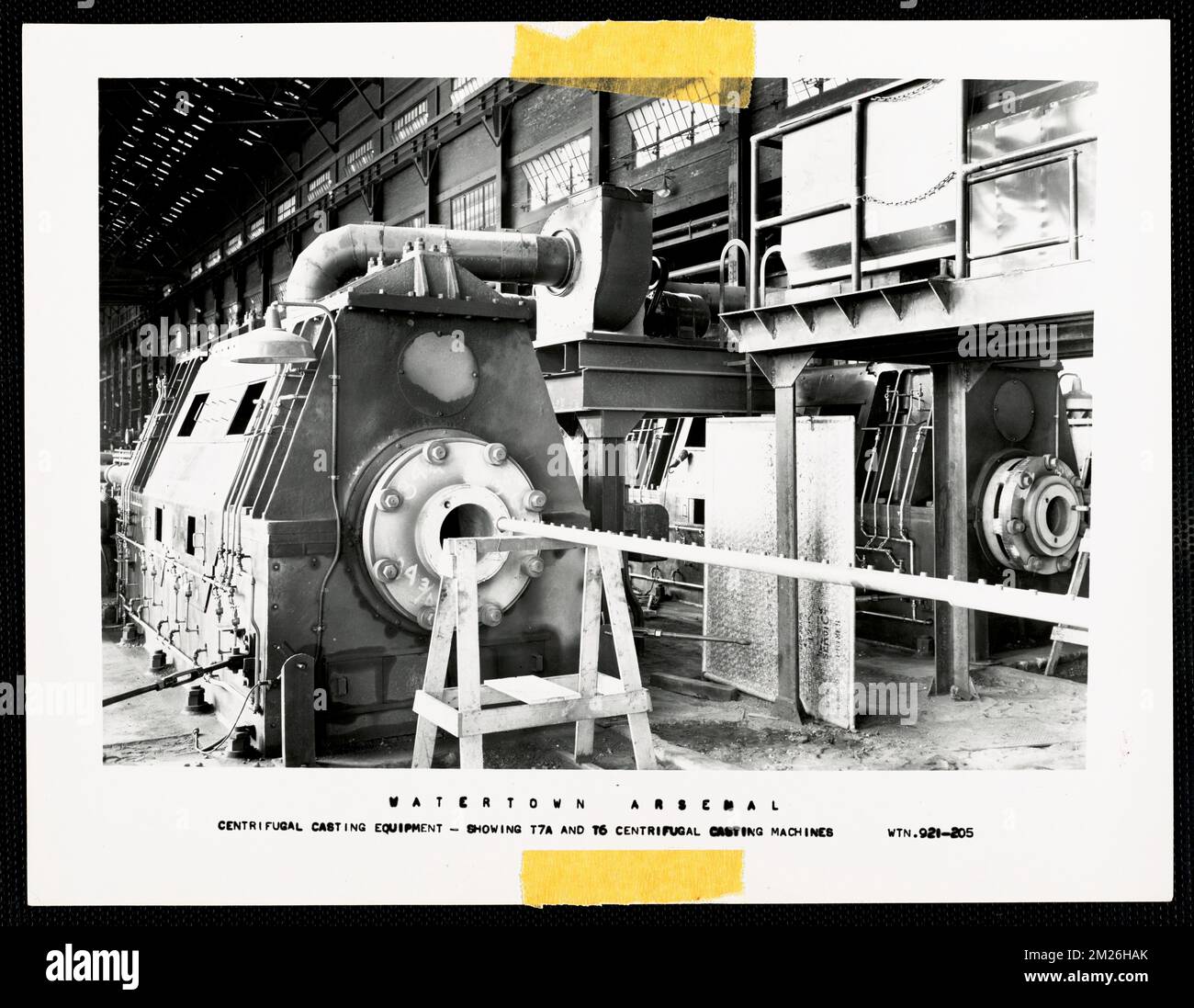 Centrifugal casting equipment, showing T7A and T6 centrifugal casting machines , Armories, Ordnance industry, Machinery, Watertown Arsenal Mass..  Records of U.S. Army Operational Stock Photo