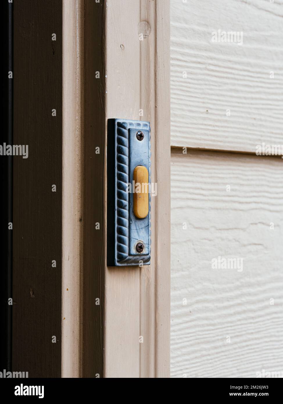 Doorbell at the front door of a residential house or home. Stock Photo