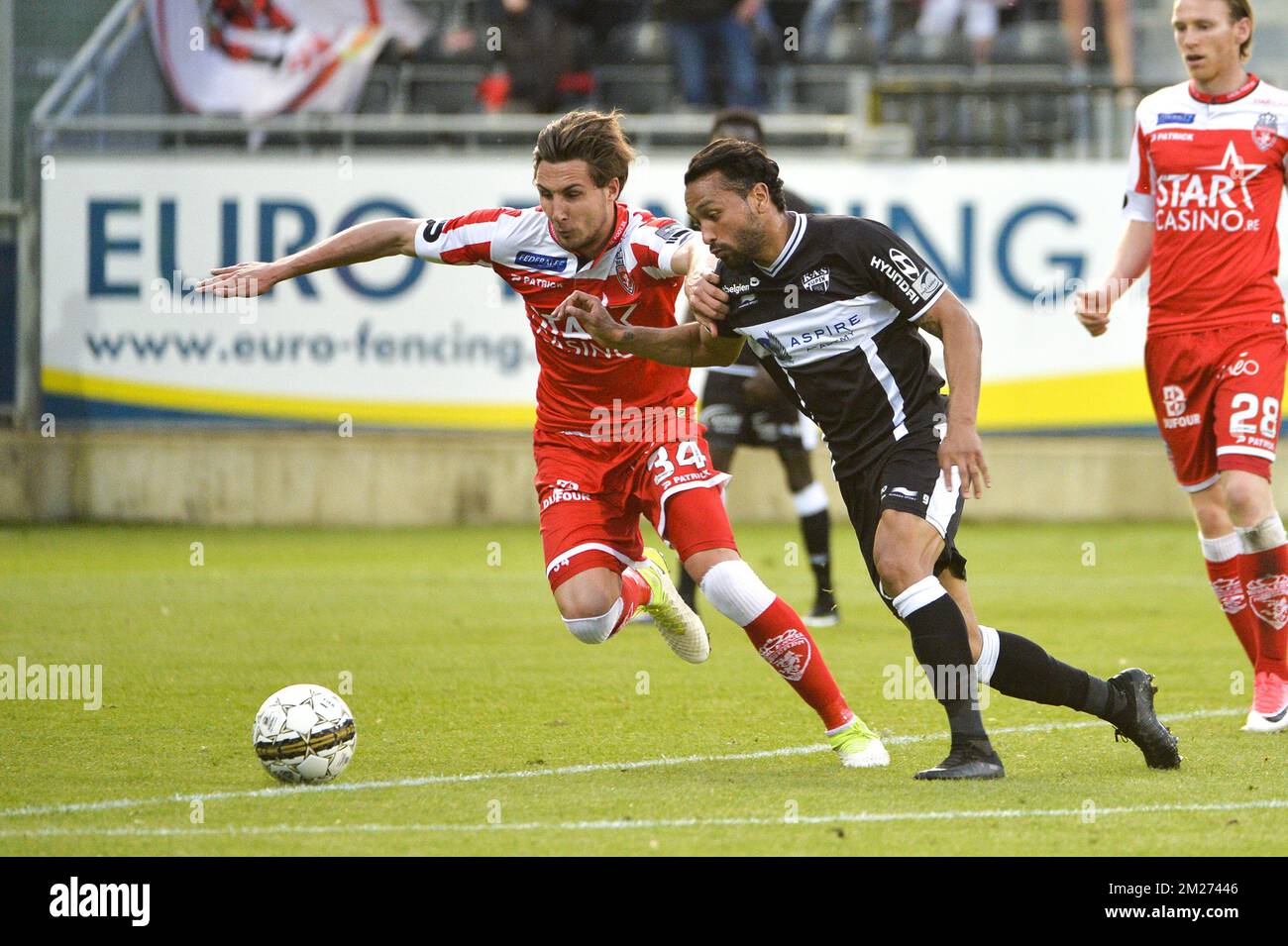 Mouscron's Stefan Simic and Eupen's Jeffren Issac Suarez Bermudez pictured during the Jupiler Pro League match between KAS Eupen and Royal Excel Mouscron, in Eupen, Wednesday 17 May 2017, on day 9 (out of 10) of the Play-off 2B of the Belgian soccer championship. BELGA PHOTO NICOLAS LAMBERT Stock Photo