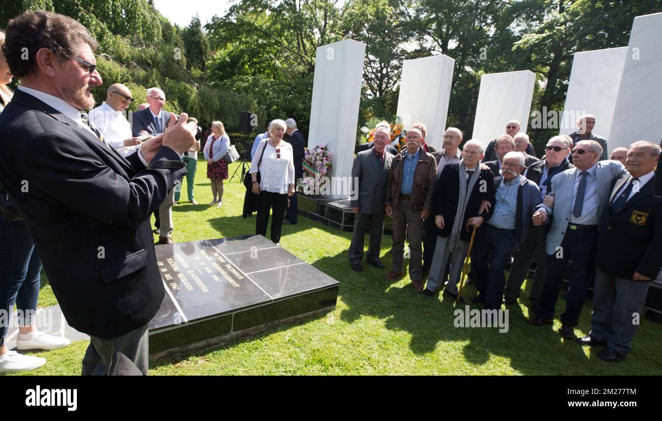 Former firemen who assist disaster's victims pose after a tribute for the fiftieth anniversary of the Innovation fire disaster in Brussels cemetery, Monday 22 May 2017. 261 persons died in the fire of the department store. BELGA PHOTO BENOIT DOPPAGNE Stock Photo