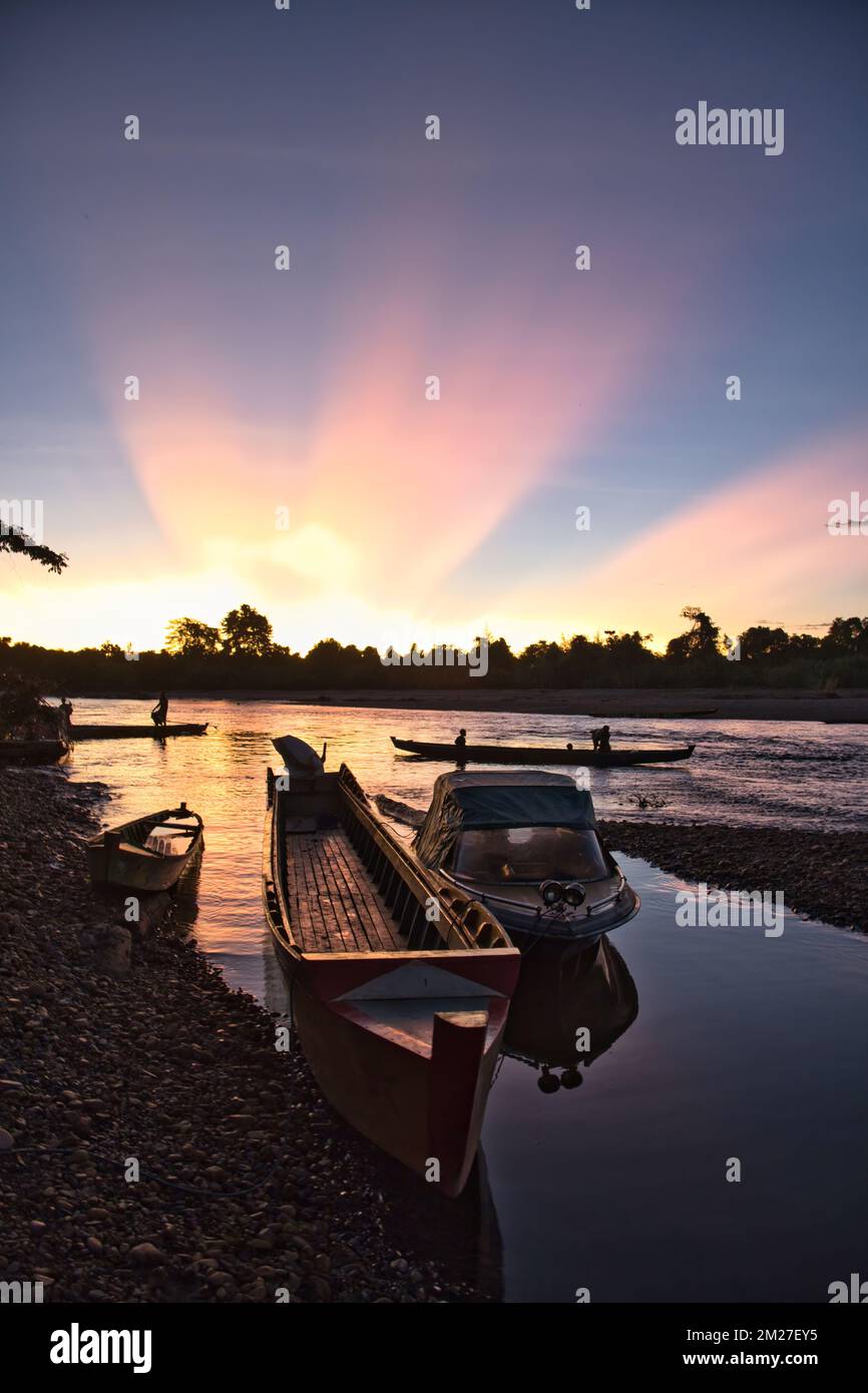 Sunset at Mabul village  Taken @Mabul village, Distrik Korowai Buluanop., Papua, Indonesia Stock Photo