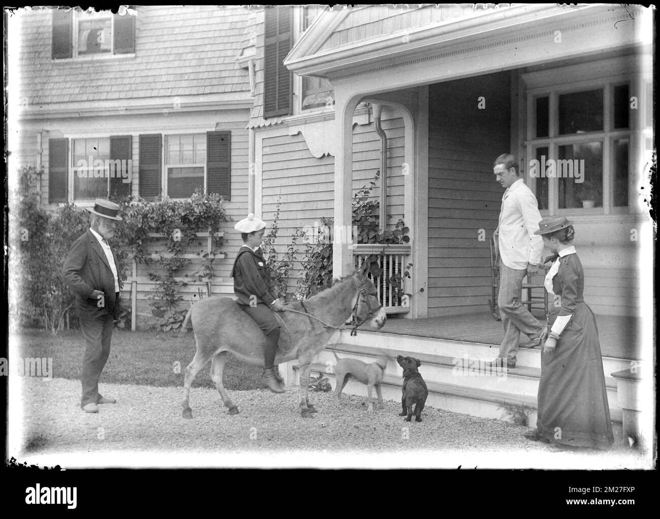 Charles W. Parker (in jacket and hat) with family at 'Redgate