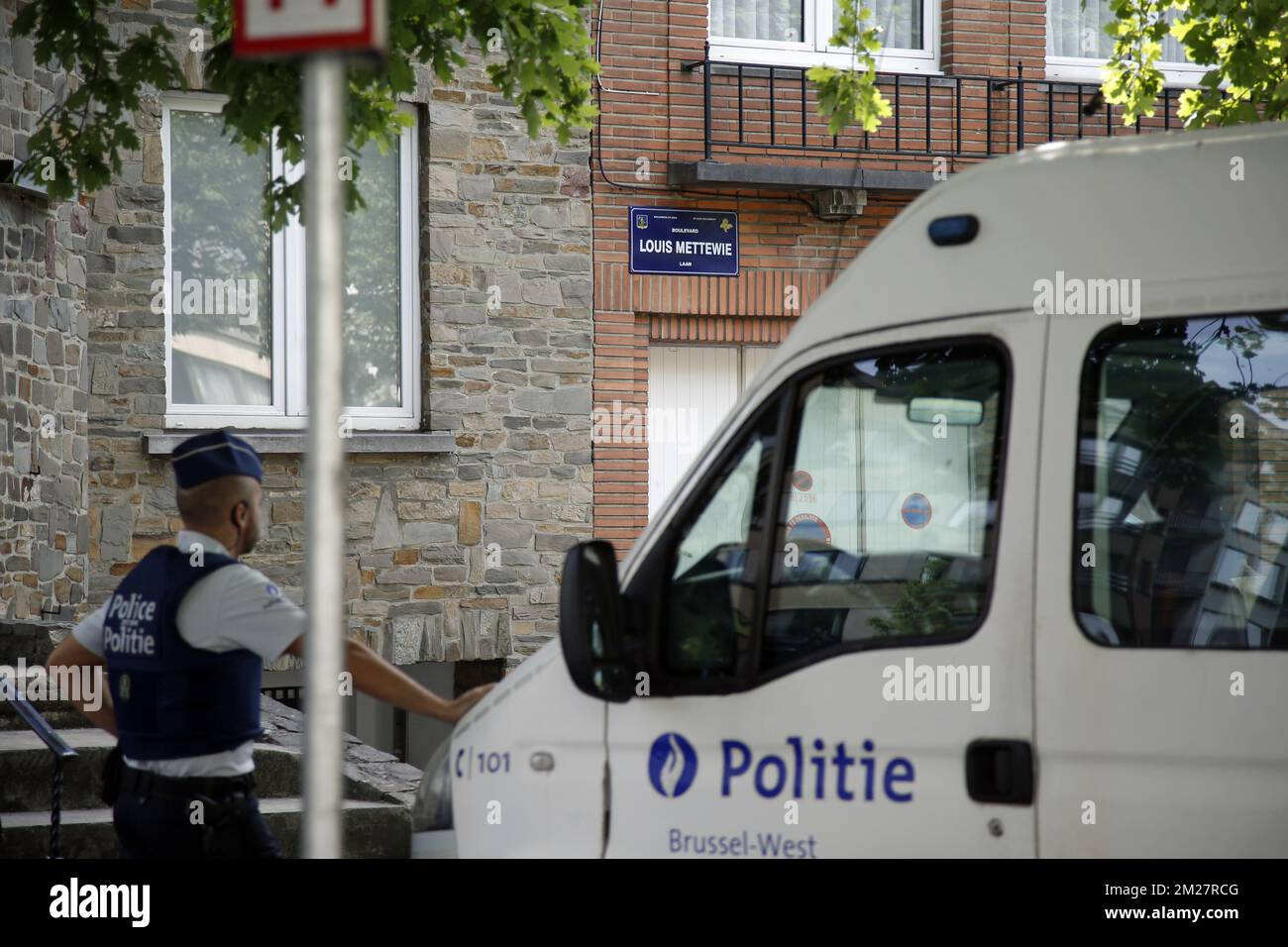 Forensic police pictured during searchings in the house of the perpetrator in the Louis Mettewielaan - Boulevard Louis Mettewie street in Sint-Jans-Molenbeek - Molenbeek-Saint-Jean, Brussels, . Yesterday a small explosion occurred in the 'Brussels Central - Bruxelles-Central - Brussel-Centraal' train station. The suspected terrorist was shot dead on the scene, according to the first information he is the only victim of the incident. BELGA PHOTO BRUNO FAHY Stock Photo