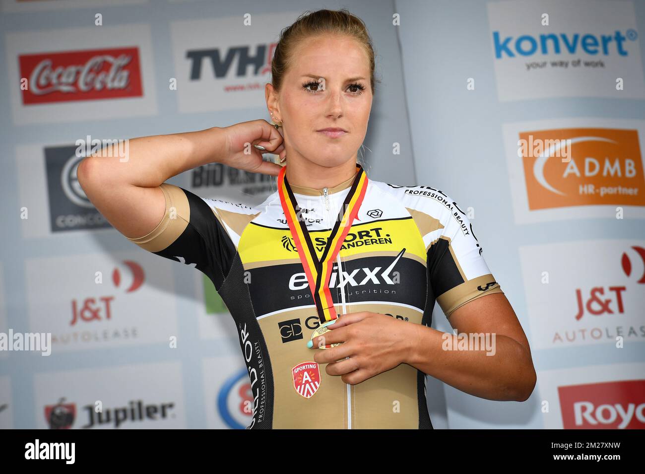 Belgian Kelly Druyts celebrates on the podium after the women's elite