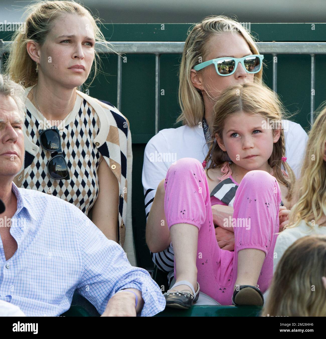 German Player Tommy Haas's daughter Valentina (R) and his wife Sara Foster (L) pictured during a first round game of gentlemens' singles between German Tommy Haas (ATP 254) and Belgian Ruben Bemelmans (ATP 124) at Wimbledon grand slam tennis tournament at the All England Tennis Club, in southwest London, Britain, Monday 03 July 2017. BELGA PHOTO BENOIT DOPPAGNE Stock Photo