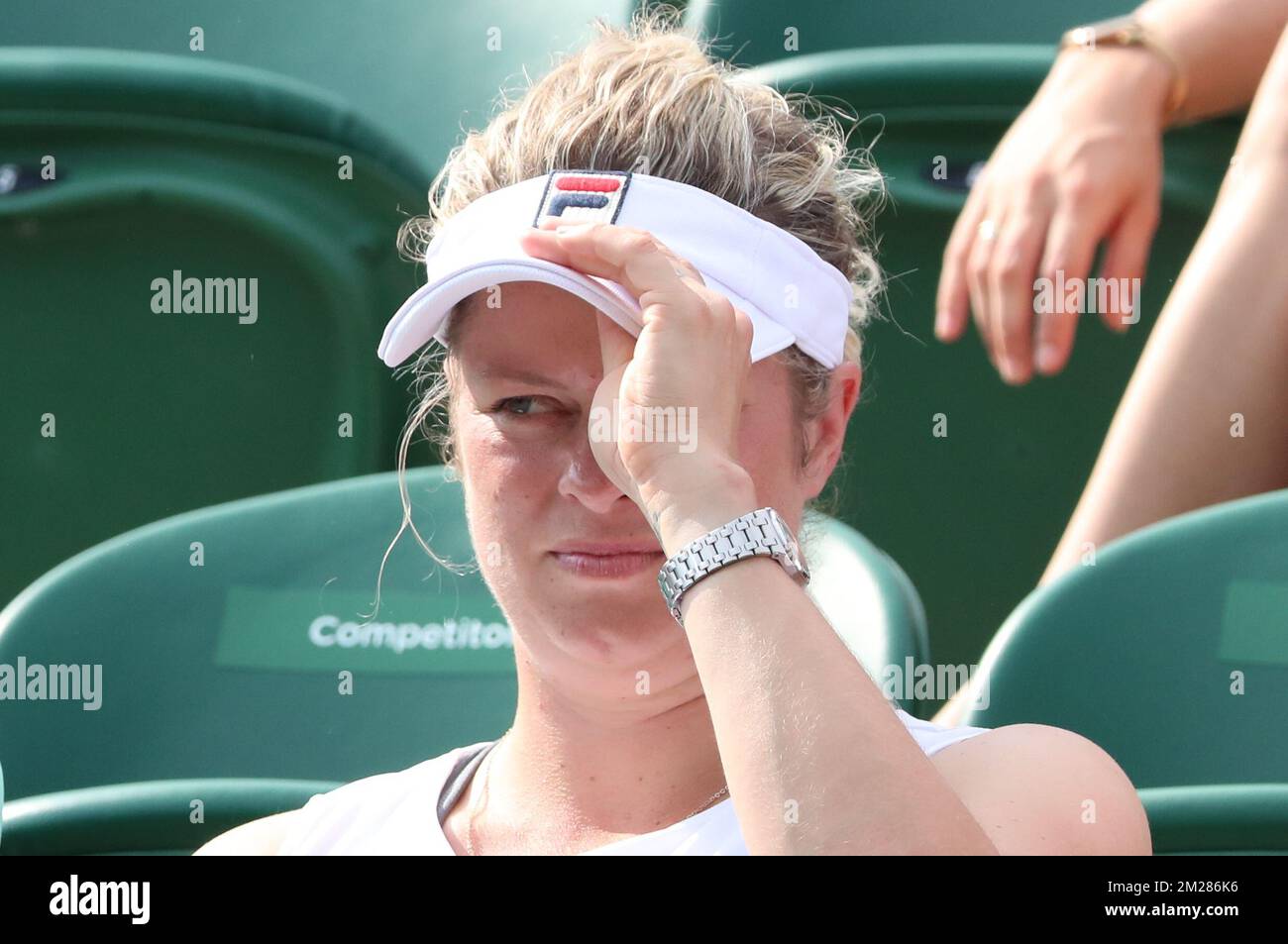 Former tennis number 1 Kim Clijsters looks on during a tennis game