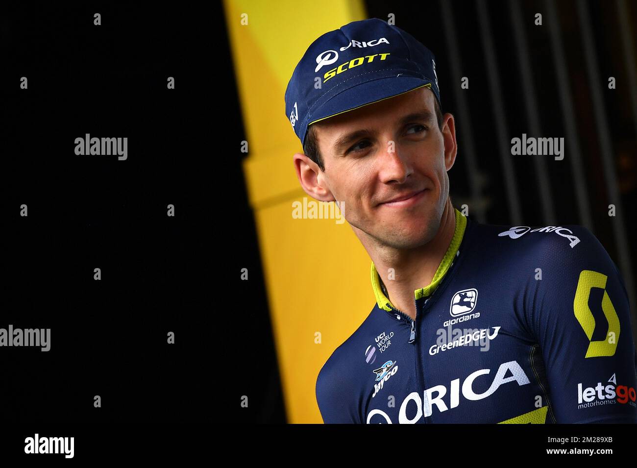 Great Britain Simon Yates of Orica - Scott celebrates on the podium after the 11th stage of the 104th edition of the Tour de France cycling race, 203,5km from Eymet to Pau, France, Wednesday 12 July 2017. This year's Tour de France takes place from July first to July 23rd. BELGA PHOTO DAVID STOCKMAN Stock Photo