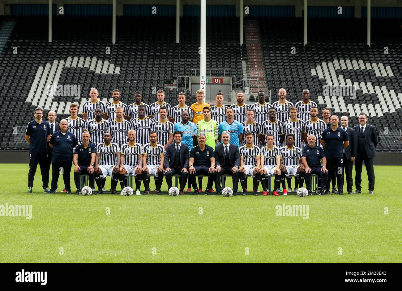 Top Row (L-R): Florent Stevance, 09 Kaveh Rezaei, , 19 Clinton Mata, 03 Steeven Willems, 14 Christian Benavente, 12 Joachim Imbrechts, 22 Gaetan Hendrickx, 26 Marco Ilaimaharitra, 77 Mamadou Fall, 24 Dorian Dessoleil, Dodi Lukebakio, Middle Row (L-R): general secretary Pierre-Yves Hendrickx, Nathan Rodes, 13 Christophe Diandy, 10 David Pollet, 99 Chris Bedia, 06 Gjoko Zajkov, 35 goalkeeper Parfait Mandanda, 15 goalkeeper Valentin Baume, 01 goalkeeper Nicolas Penneteau, 07 Clement Tainmont, 18 Amara Baby, 05 Benjamin Boulenger, Julien Celestine, doctor Frederic Borlee, delegate Arnaud Charlier, Stock Photo