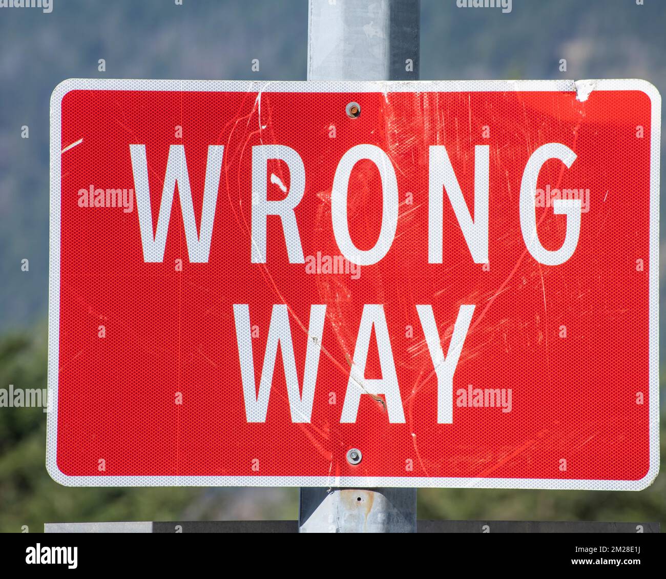 Wrong way sign at at the highway junction in Hope, British Columbia, Canada Stock Photo