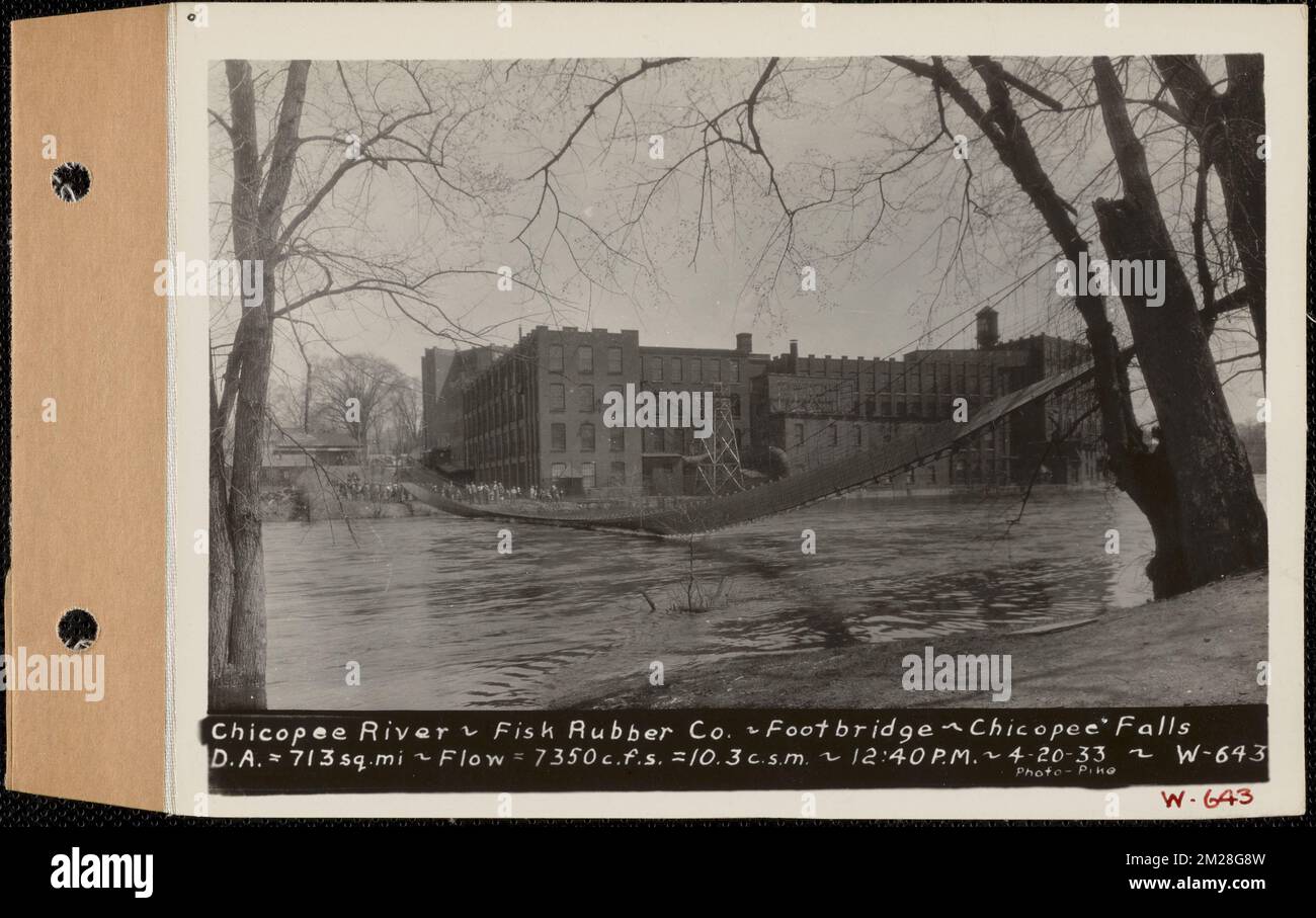 Chicopee River, Fisk Rubber Co., Footbridge, Chicopee Falls, drainage area - 713 square miles, flow - 7350 cubic feet per second - 10.3 cubic feet per second per square mile, Chicopee, Mass., 12:40 PM, Apr. 20, 1933 , waterworks, real estate, rivers, watershed sanitary conditions, floods natural events, factories structures, footbridges Stock Photo