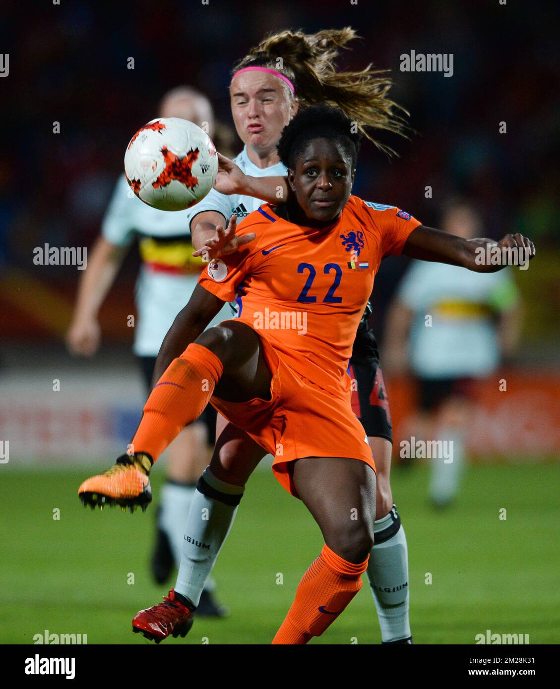 Dutch Liza van der Most and Belgium's Davinia Vanmechelen pictured in action during a soccer game between Belgian national women's soccer team Red Flames and The Netherlands, the third game in group A in the group stage of the Women's European Championship 2017 in the Netherlands, Monday 24 July 2017 in Tilburg, The Netherlands. BELGA PHOTO DAVID CATRY Stock Photo