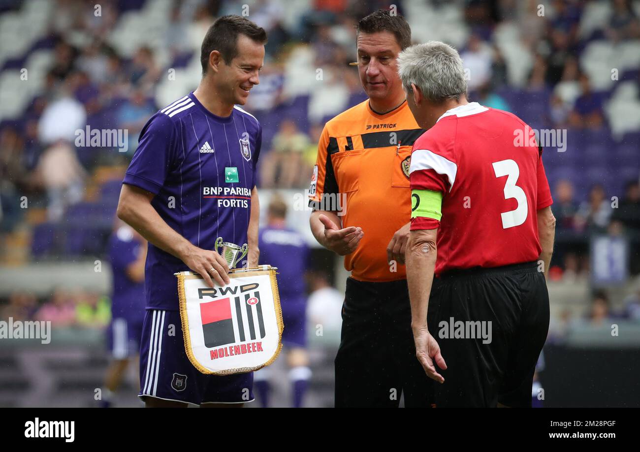 Gilles De Bilde, Referee Laurent Colemont and Eric Dumon pictured during a derby Legends game between RSCA and RWDM at the fan day of soccer team RSC Anderlecht, Sunday 30 July 2017 in Anderlecht, Brussels. BELGA PHOTO VIRGINIE LEFOUR Stock Photo