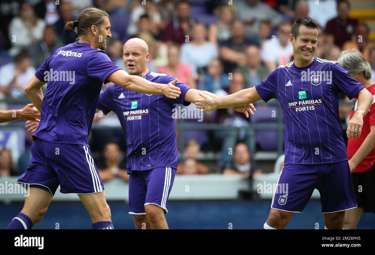 Anderlecht's assistant coach Nicolas Frutos and Gilles De Bilde celebrate after scoring during during a derby Legends game between RSCA and RWDM at the fan day of soccer team RSC Anderlecht, Sunday 30 July 2017 in Anderlecht, Brussels. BELGA PHOTO VIRGINIE LEFOUR Stock Photo