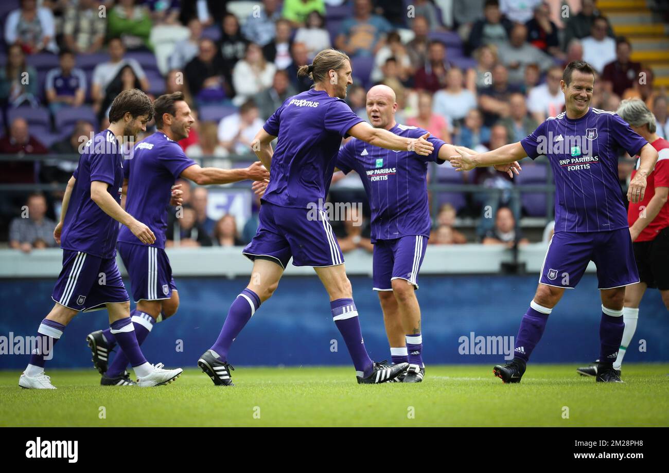 Anderlecht's assistant coach Nicolas Frutos and Gilles De Bilde celebrate after scoring during during a derby Legends game between RSCA and RWDM at the fan day of soccer team RSC Anderlecht, Sunday 30 July 2017 in Anderlecht, Brussels. BELGA PHOTO VIRGINIE LEFOUR Stock Photo
