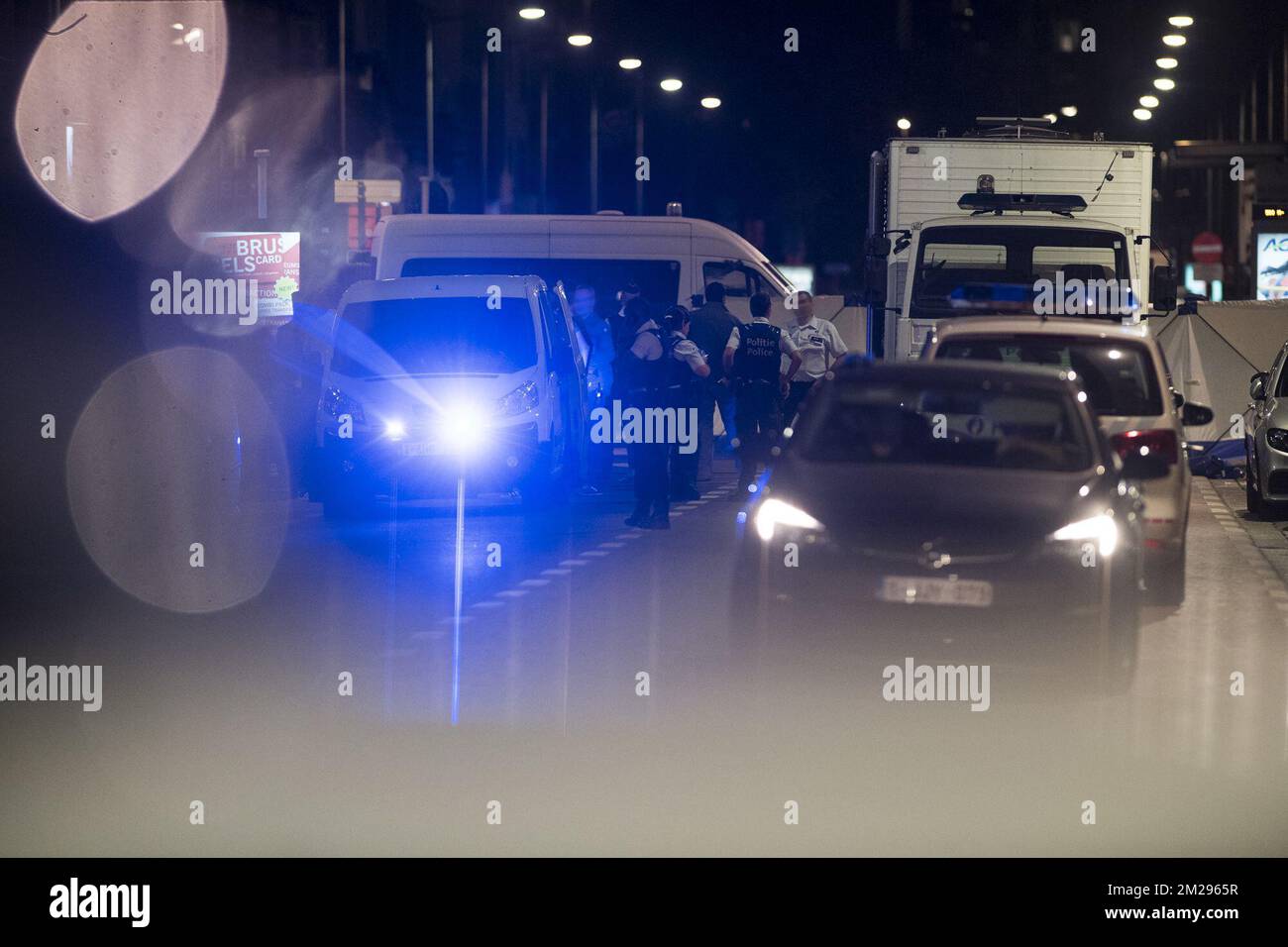 Police pictured at the scene where a man attacked soldiers with a knife and was shot in the Boulevard Emile Jacqmain - Emile Jacqmainlaan in the city centre of Brussels, Friday 25 August 2017. BELGA PHOTO LAURIE DIEFFEMBACQ Stock Photo