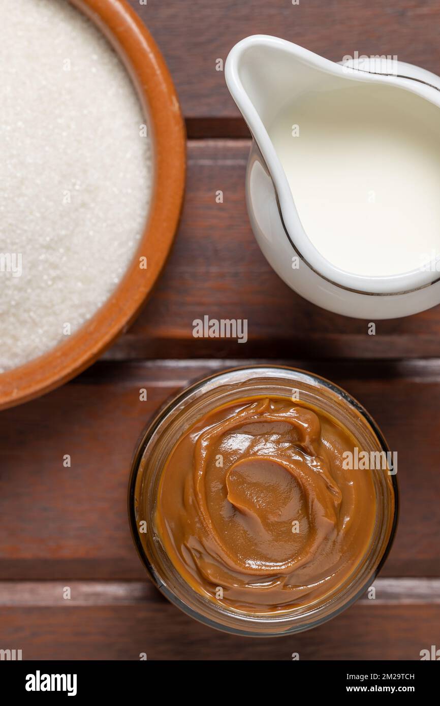 Top view of Dulce de leche, traditional sweet from Argentina with milk ...