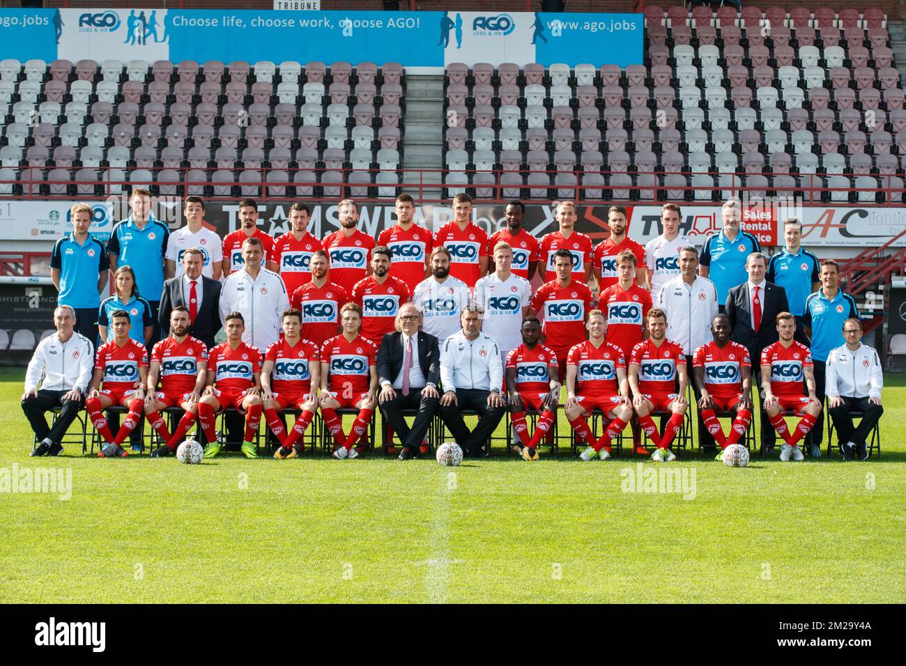 Kortrijk's players pose for photographer at another session after the