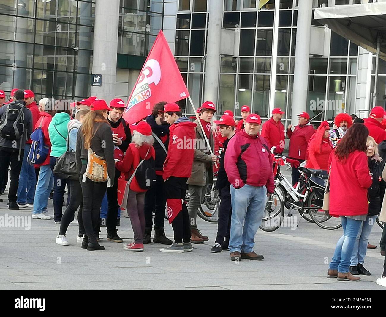 Members of PVDA youth organisation COMAC and socialist trade union ACOD in front of the Gent city administration center at Gent-Zuid regarding a general strike called by FGTB-CGSP/ ABVV-ACOD socialist union, Tuesday 10 October 2017, in Gent. BELGA PHOTO SABINE BERTH  Stock Photo