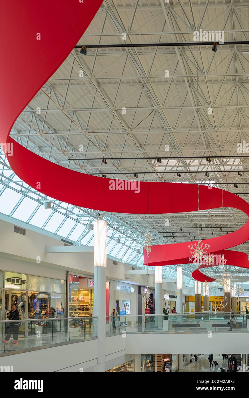 Interior in a modern shopping center. sale, consumerism and people ...