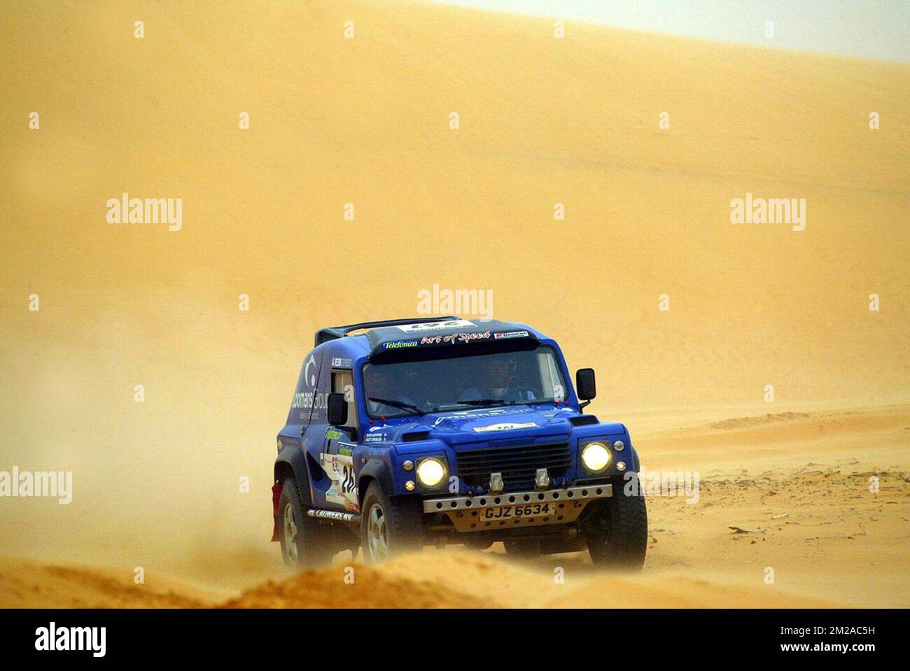 Belgium's Jacky Loomans and Marc Lauwers steer their Land Rover car during the 8th stage of the 26th Dakar rally raid, between Atar and Tidjikja in Mauritania. Stock Photo
