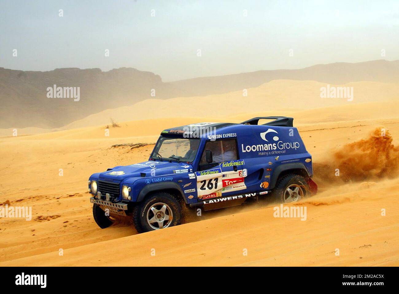 Belgium's Jacky Loomans and Marc Lauwers steer their Land Rover during the 9th stage of the 26th Dakar rally raid, between Tidjikja and Nema in Mauritania. Stock Photo