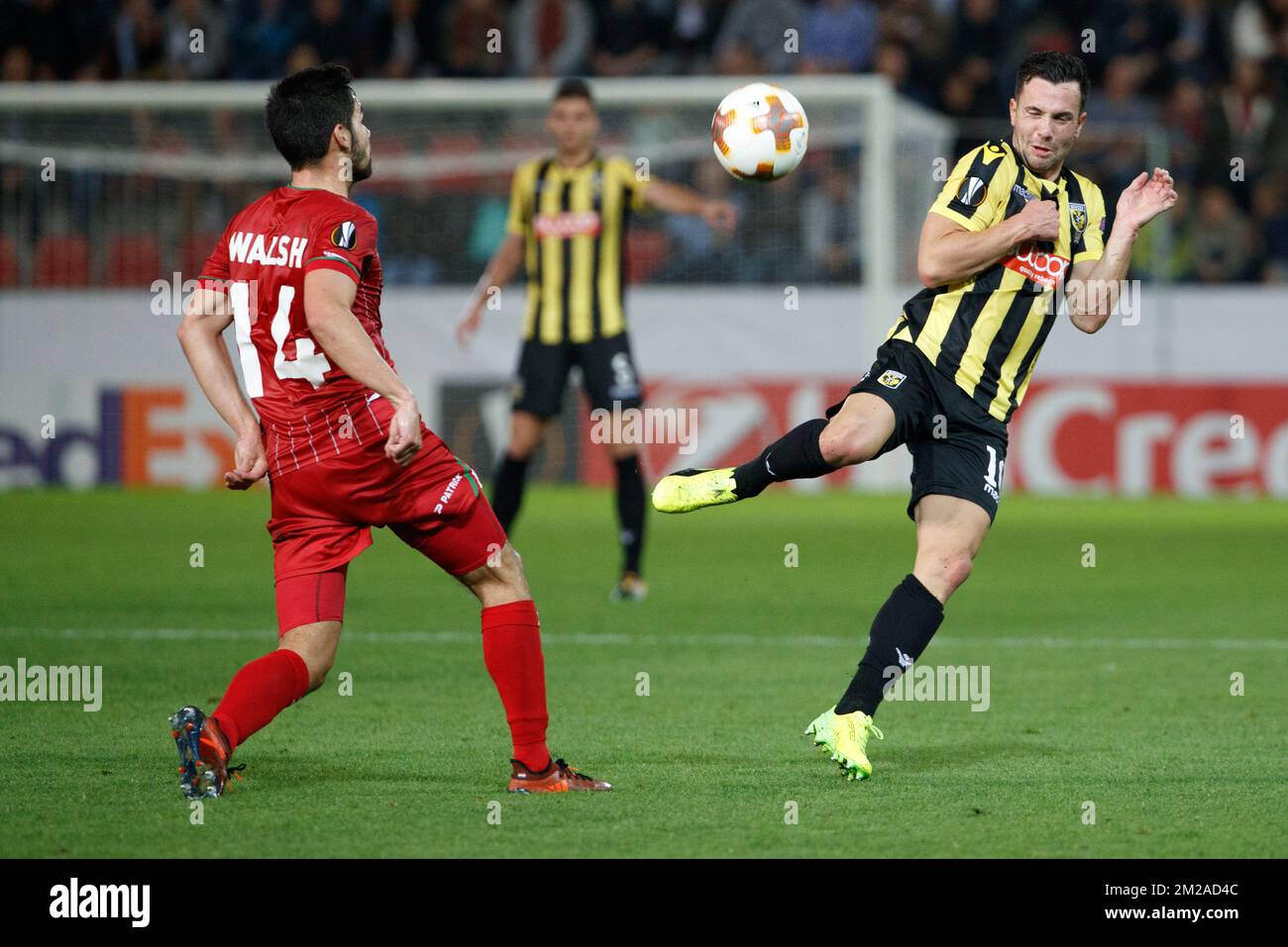 Essevee's Sandy Walsh and Vitesse's Thomas Bruns fight for the ball during the third game of the group stage (Group K) of the UEFA Europa League competition between Belgian first league Zulte Waregem and Dutch club Vitesse Arnhem, in Waregem, Thursday 19 October 2017. BELGA PHOTO KURT DESPLENTER Stock Photo