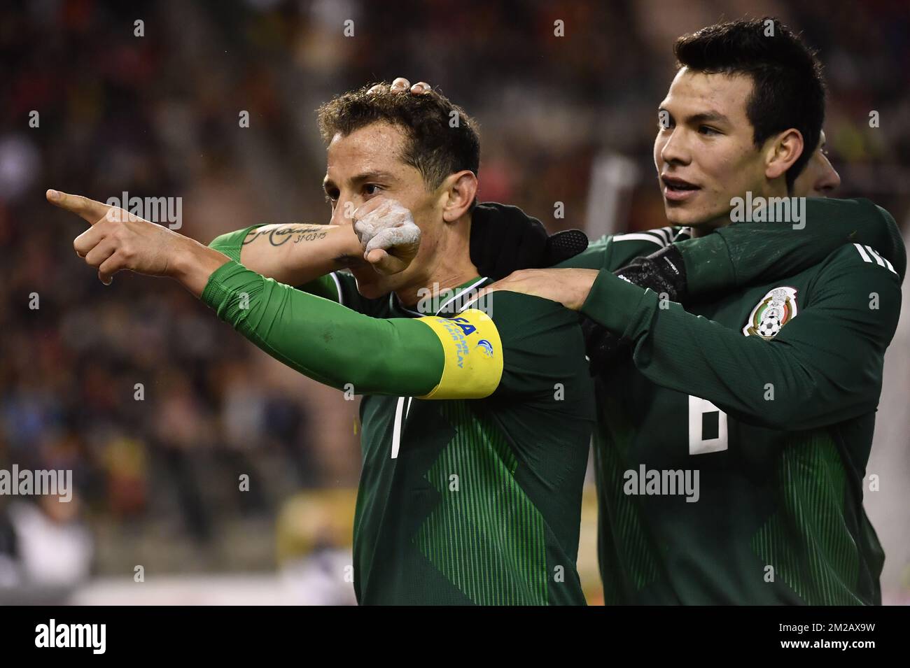 Mexico's Andres Guardado and Mexico's Hirving Lozano celebrate after Guardado scored from penalty during a friendly soccer game between Belgian national team Red Devils and Mexico, Friday 10 November 2017, in Brugge. BELGA PHOTO DIRK WAEM  Stock Photo