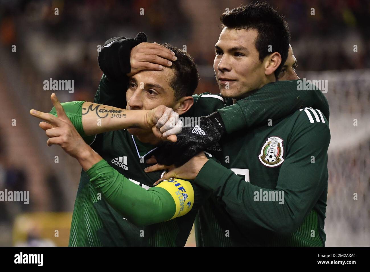 Mexico's Andres Guardado and Mexico's Hirving Lozano celebrate after Guardado scored from penalty during a friendly soccer game between Belgian national team Red Devils and Mexico, Friday 10 November 2017, in Brugge. BELGA PHOTO DIRK WAEM  Stock Photo
