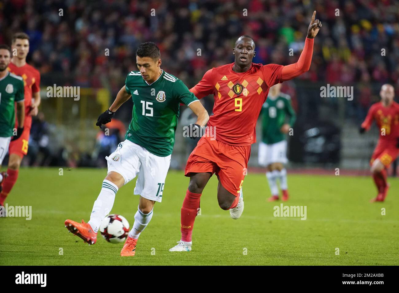 Mexico's Hector Moreno and Belgium's Romelu Lukaku fight for the ball during a friendly soccer game between Belgian national team Red Devils and Mexico, Friday 10 November 2017, in Brugge. BELGA PHOTO BRUNO FAHY Stock Photo
