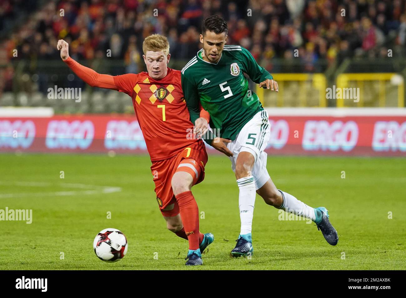 Belgium's Kevin De Bruyne and Mexico's Diego Reyes fight for the ball during a friendly soccer game between Belgian national team Red Devils and Mexico, Friday 10 November 2017, in Brugge. BELGA PHOTO BRUNO FAHY Stock Photo