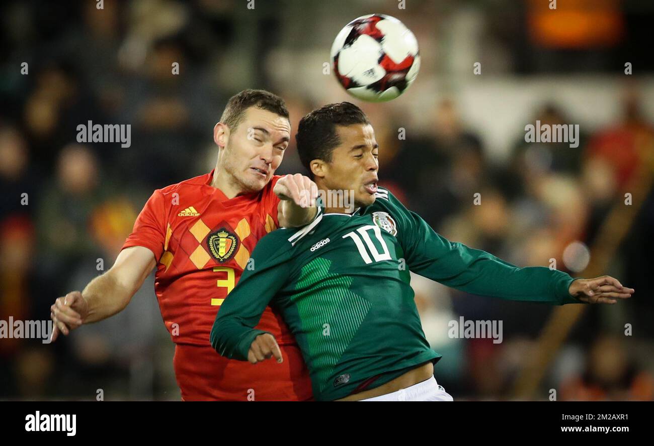 Belgium's Thomas Vermaelen and Mexico's Giovani dos Santos fight for the ball during a friendly soccer game between Belgian national team Red Devils and Mexico, Friday 10 November 2017, in Brugge. BELGA PHOTO VIRGINIE LEFOUR Stock Photo