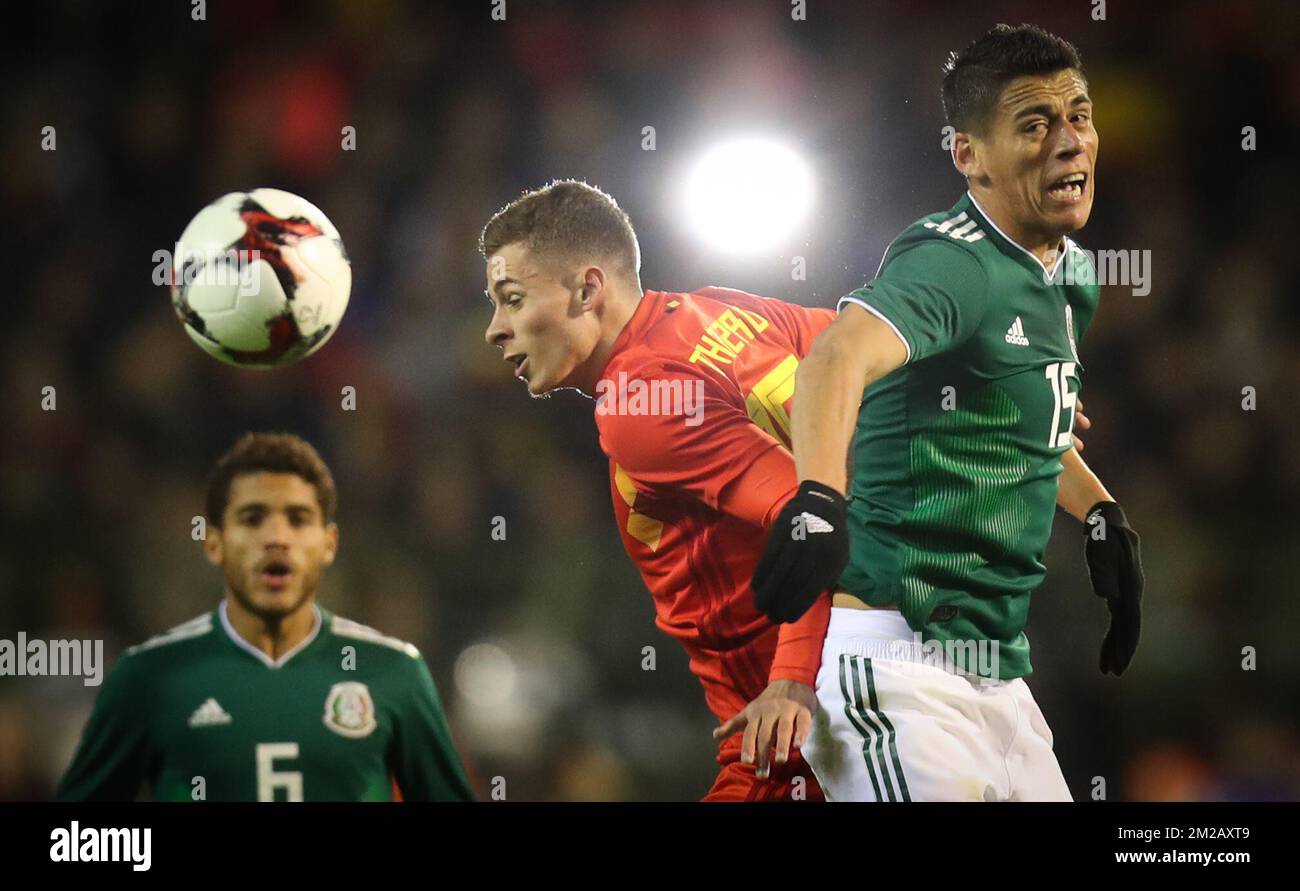 Belgium's Thorgan Hazard and Mexico's Hector Moreno fight for the ball during a friendly soccer game between Belgian national team Red Devils and Mexico, Friday 10 November 2017, in Brugge. BELGA PHOTO VIRGINIE LEFOUR Stock Photo